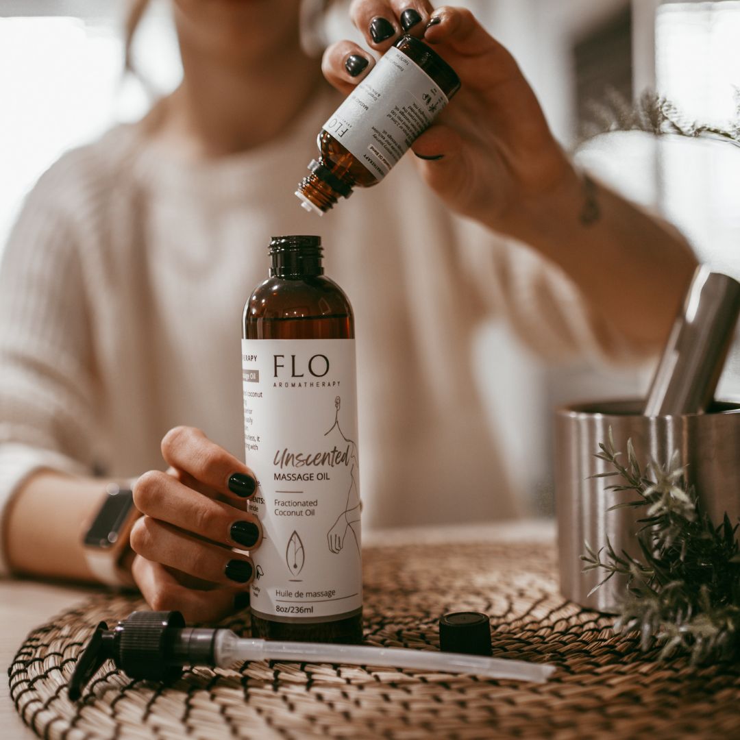 Collection of massage mixes in bottles, designed for various therapeutic benefits.